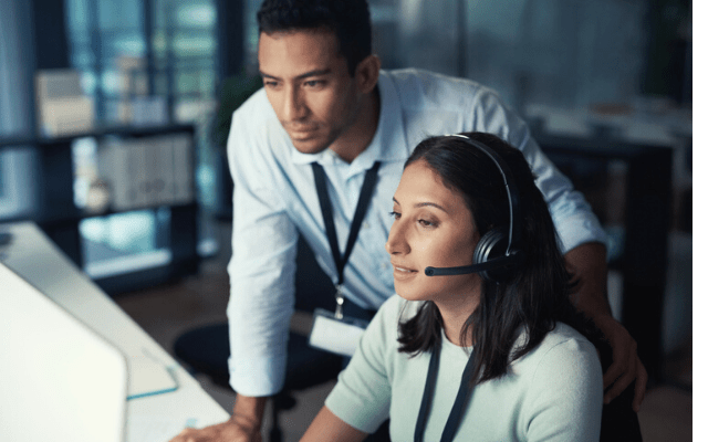 people speaking in front of computer