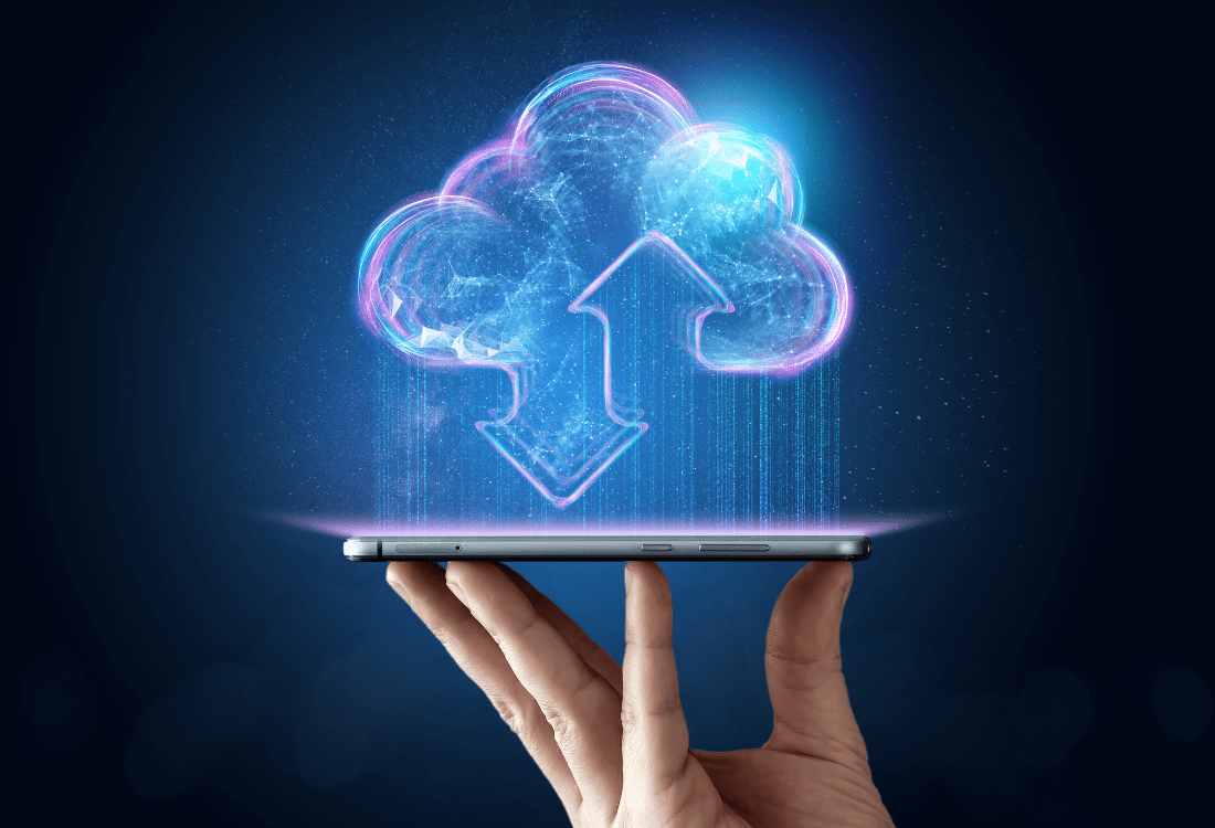 A hand holds a smartphone displaying a glowing, cloud icon with an upward arrow, symbolising data upload and cloud computing with HPE MP Alletra Storage. The background is dark blue with a subtle light flare.