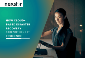 IT professional using digital analytics to manage cloud-based disaster recovery, illustrating how cloud solutions enhance business resilience and data protection.